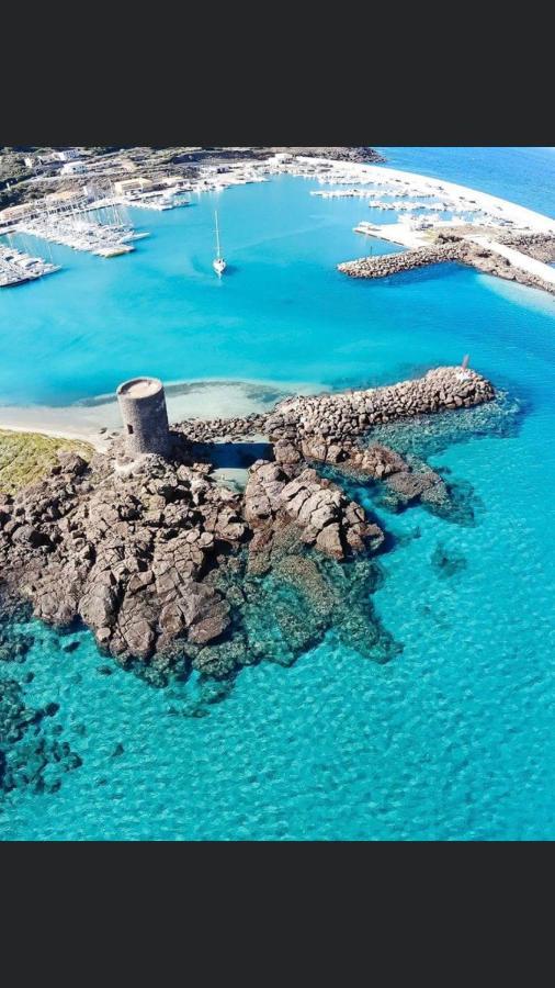 Bella'S House Apartment Castelsardo Bagian luar foto