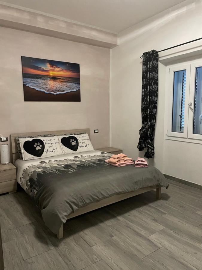 Bella'S House Apartment Castelsardo Bagian luar foto